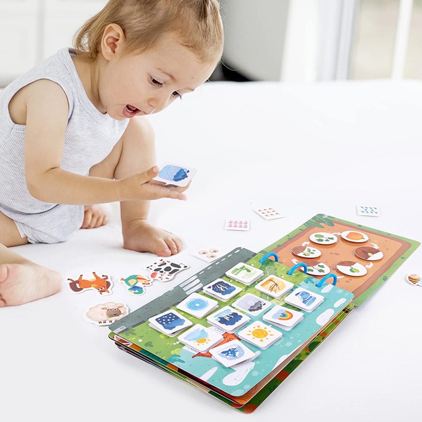 Child playing with quiet activity book