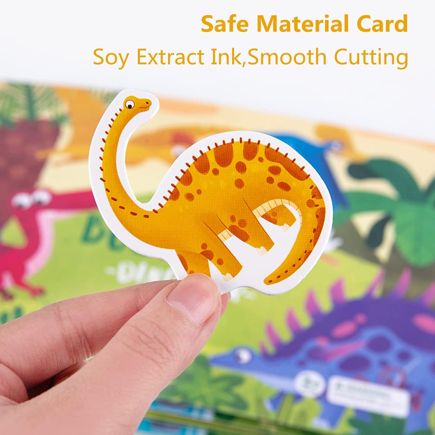 Child playing with quiet activity book