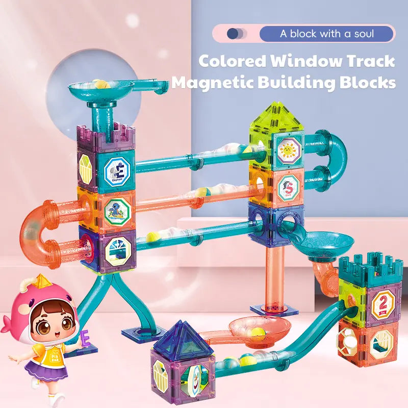 Child building a glowing marble run tower with magnetic tiles
LED marble run toy for 3+ years kids